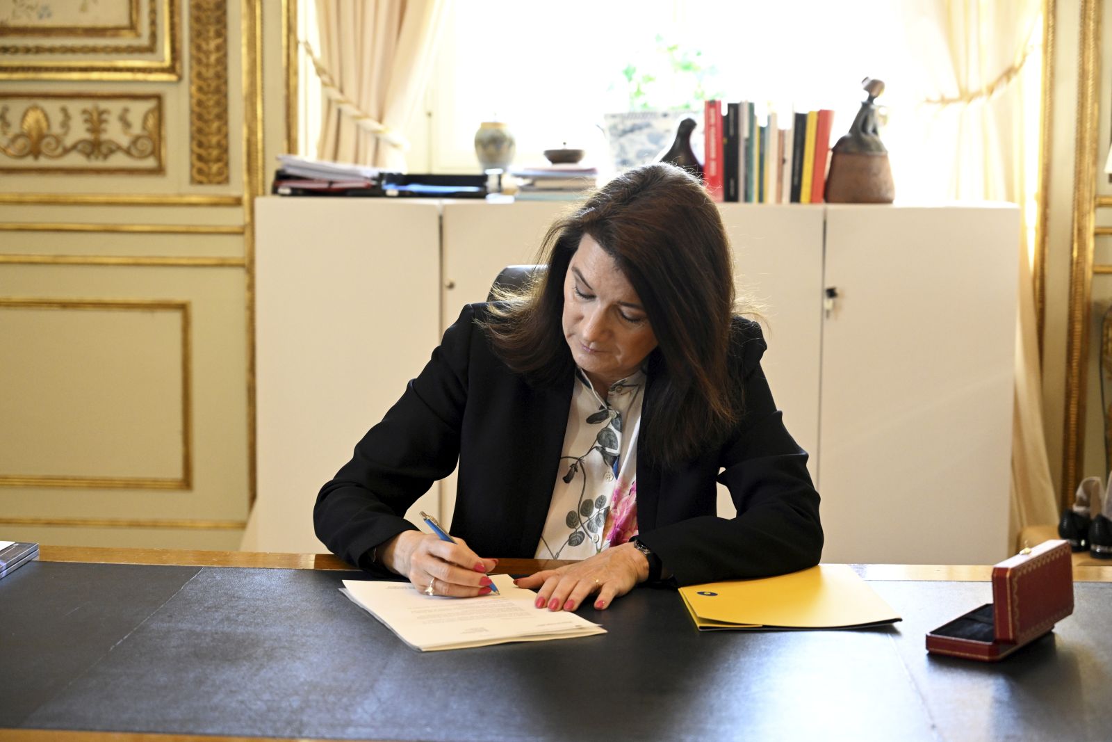 epa09952060 Sweden's Minister of Foreign Affairs Ann Linde signs Sweden's application for NATO membership at the Ministry of Foreign Affairs in Stockholm, Sweden, 17 May 2022. The Swedish Parliament the previous day held a special debate about applying for NATO membership. The leaders of Sweden and Finland have confirmed they will apply for NATO membership as a result of Russia's invasion of Ukraine.  EPA/Henrik Montgomery  SWEDEN OUT