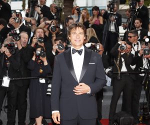 epaselect epa09955797 US actor Tom Cruise arrives for the screening of 'Top Gun: Maverick' during the 75th annual Cannes Film Festival, in Cannes, France, 18 May 2022. The movie is presented out of competition of the festival which runs from 17 to 28 May.  EPA/SEBASTIEN NOGIER