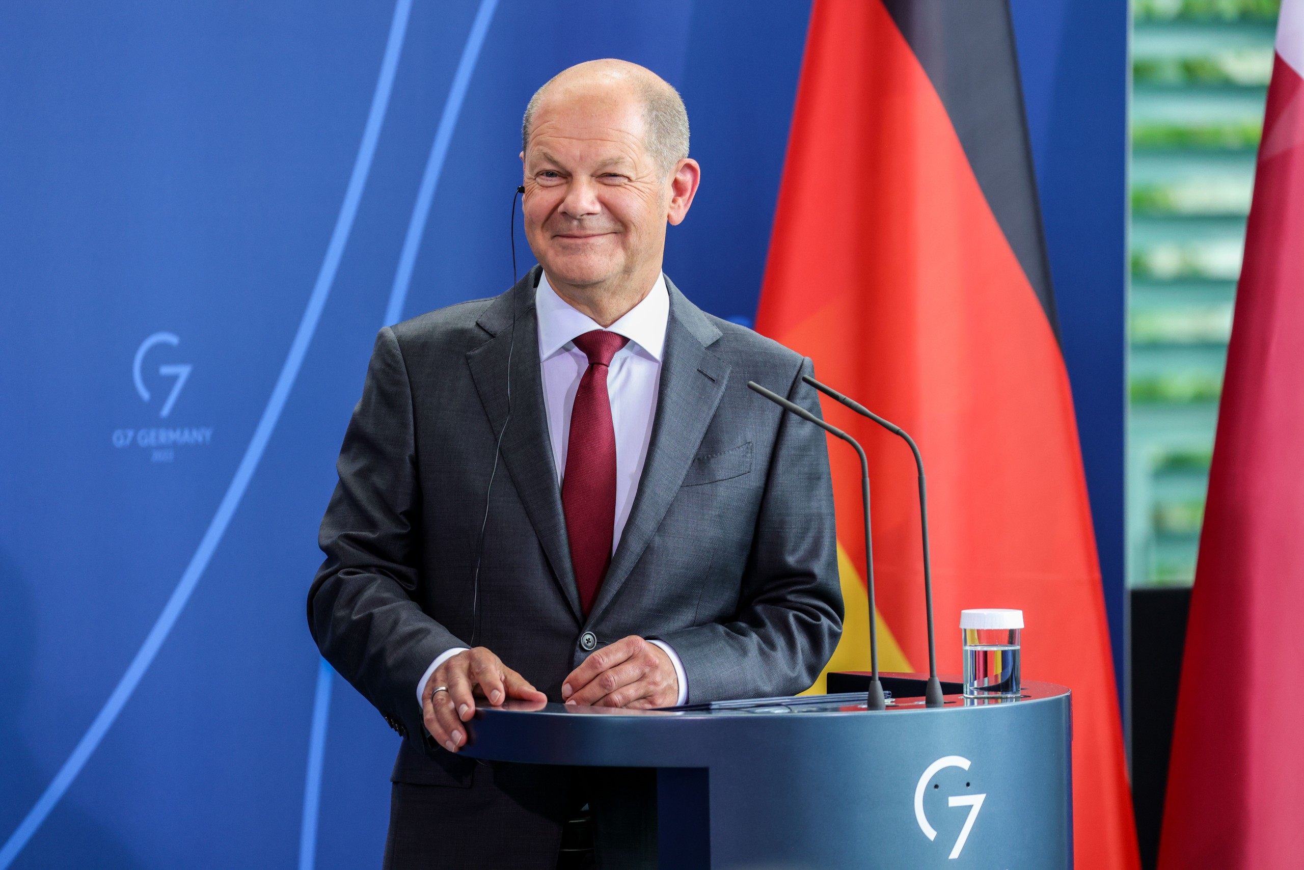 epa09960471 German Chancellor Olaf Scholz reacts during a joint press conference with Qatar's Emir Sheikh Tamim bin Hamad Al-Thani (not pictured), at the Chancellery in Berlin, Germany, 20 May 2022. Qatar and Germany signed earlier an energy partnership agreement. The Emir is on an official state visit to Germany.  EPA/OMER MESSINGER