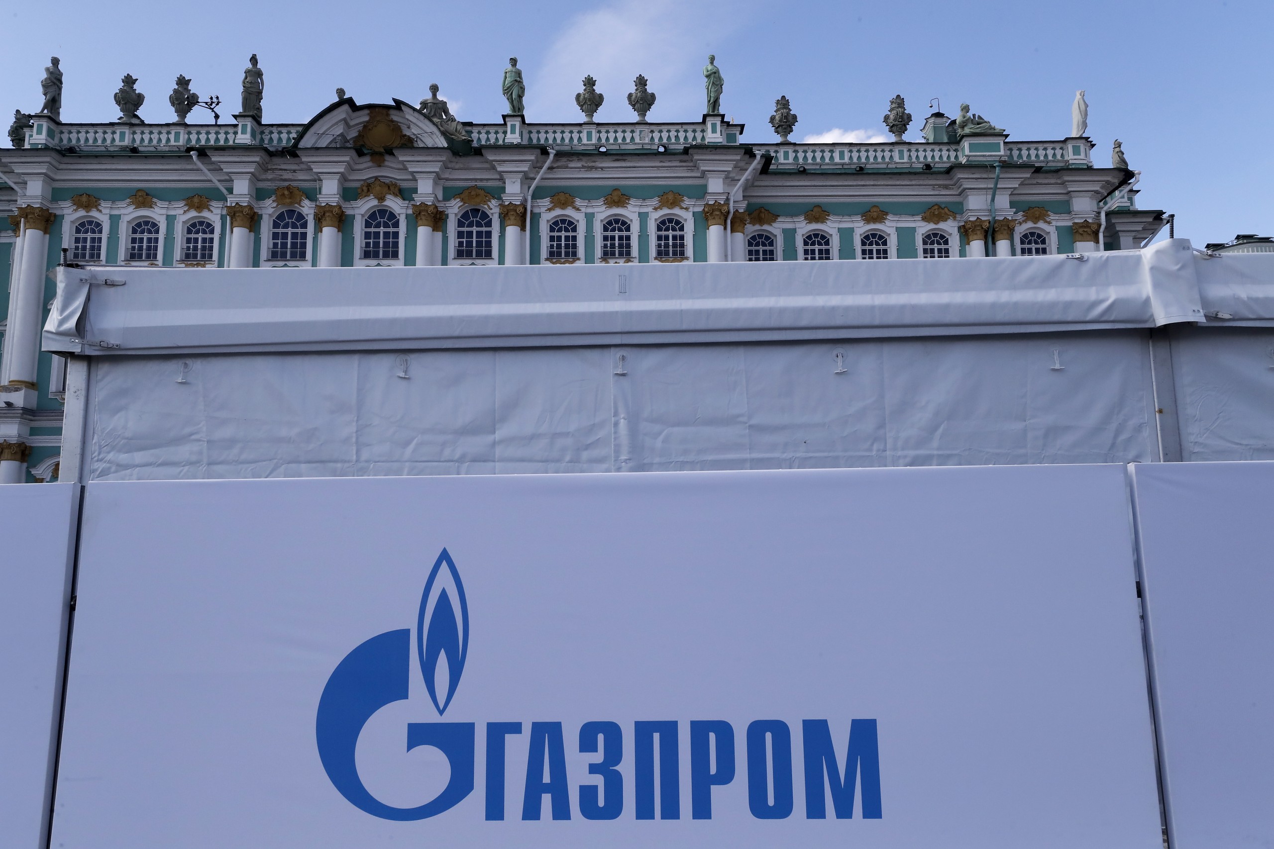 epa09980732 A banner with the Gazprom logo in front of Winter Palace at the Dvortsovaya Square in St. Petersburg, Russia, 27 May 2022.  EPA/ANATOLY MALTSEV
