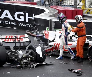 epa09984402 German Formula One driver Mick Schumacher of Haas F1 Team reacts next to his car after crashing out during the Formula One Grand Prix of Monaco at the Circuit de Monaco in Monte Carlo, Monaco, 29 May 2022.  EPA/CHRISTIAN BRUNA / POOL