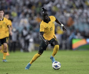 SYDNEY, AUSTRALIA - MARCH 24: Awer Mabil of Australia controls the ball during the FIFA World Cup Qualifier football match between Australia Socceroos and Japan on March 24, 2022 at Stadium Australia in Sydney, Australia. (Photo by Steven Markham/Icon Sportswire) (Icon Sportswire via AP Images)