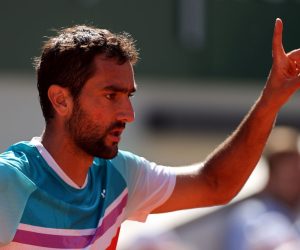 epa09989882 Marin Cilic of Croatia reacts as he plays Andrey Rublev of Russia in their men’s quarterfinal match during the French Open tennis tournament at Roland ​Garros in Paris, France, 01 June 2022.  EPA/MARTIN DIVISEK