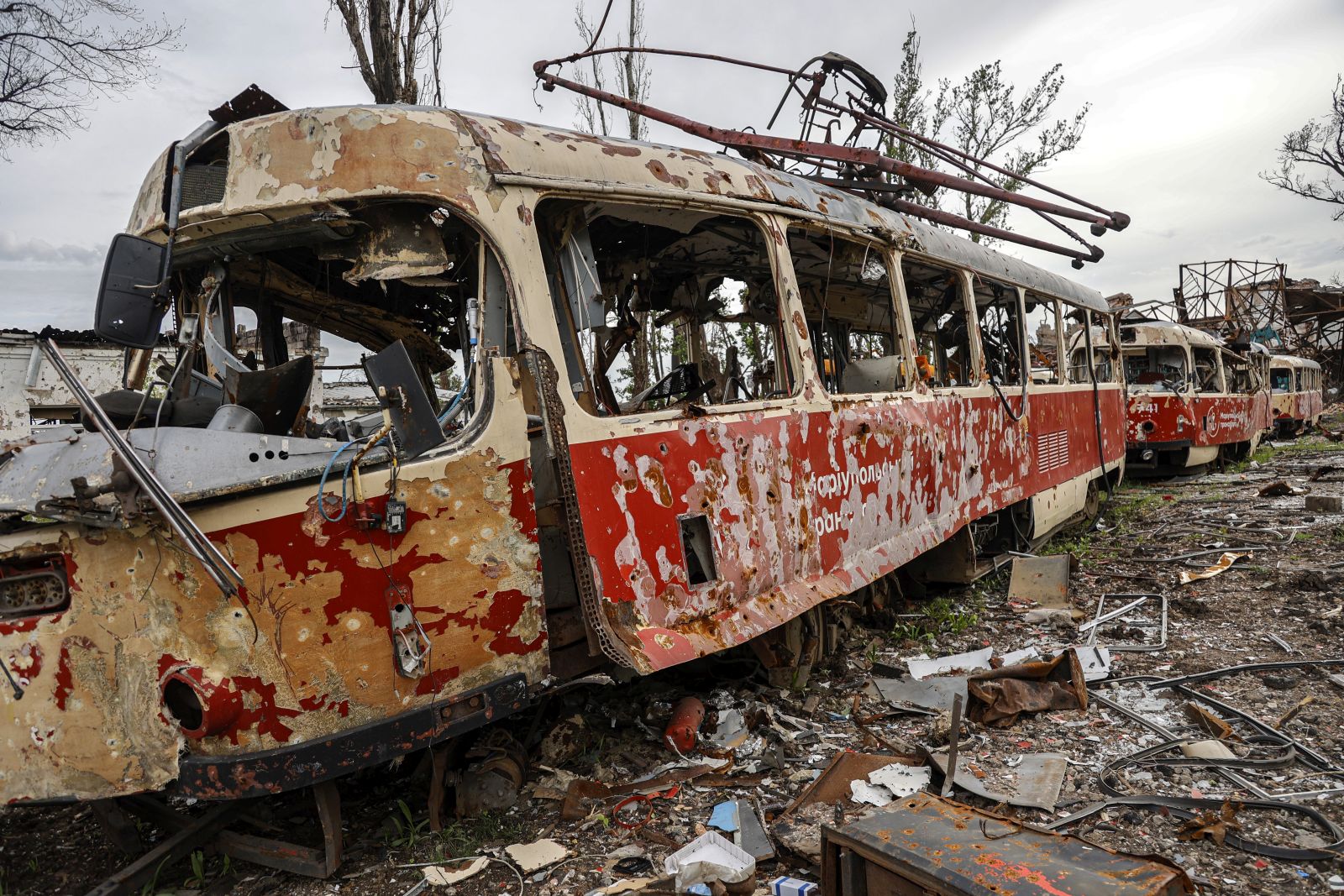 epa09991165 (FILE) - A destroyed tram at a tram depot in Mariupol, Ukraine, 21 May 2022 (reissued 03 June 2022). 04 June 2022 marks 100 days since on 24 February 2022 Russian troops invaded Ukrainian territory in what the Russian president declared a "Special Military Operation", starting an armed conflict that has provoked destruction and a humanitarian crisis. According to the UNHCR, more than 6.8 million refugees have fled Ukraine, and a further 7.7 million people have been displaced internally within Ukraine since. The Russian invasion was met by Western countries with heavy economic sanctions against Russian companies and individuals, as well as weaponry deliveries and financial support to Ukraine.  EPA/ALESSANDRO GUERRA  ATTENTION: This Image is part of a PHOTO SET *** Local Caption *** 57697128
