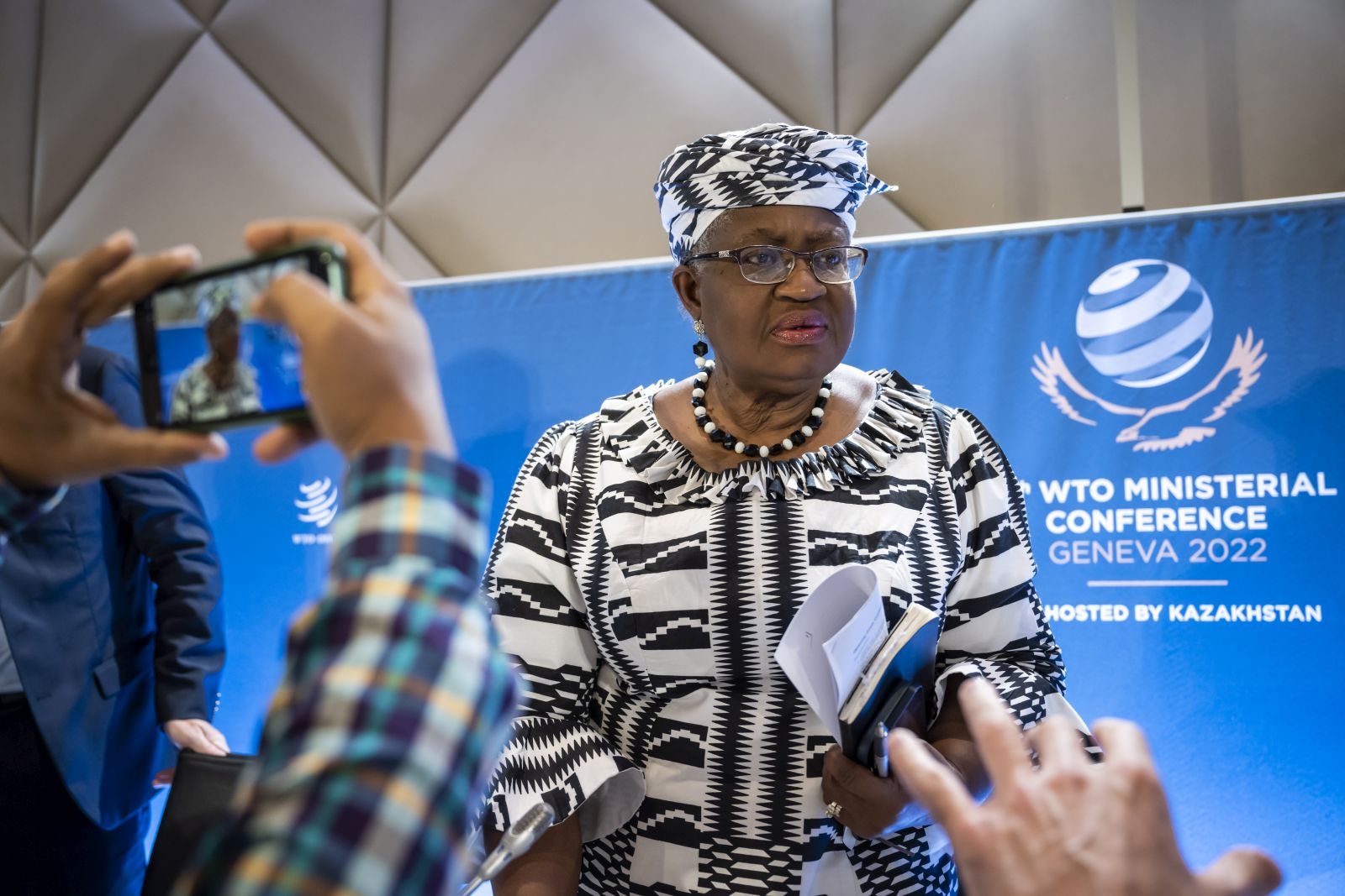 epa10009376 Nigeria's Ngozi Okonjo-Iweala, Director General of the World Trade Organisation (WTO) speaks at a press conference before the opening of the 12th Ministerial Conference (MC12) taking place from June 12-15, in Geneva, at the headquarters of the World Trade Organization (WTO), in Geneva, Switzerland, 12 June 2022.  EPA/MARTIAL TREZZINI
