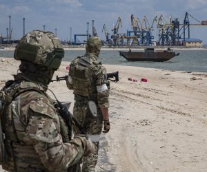 epa10009865 A picture taken during a visit to Mariupol organized by the Russian military shows Russian servicemen prepare to demine Peschnaya beach near the cargo sea port of Mariupol, Ukraine, 12 June 2022. Russian Defense Minister Sergei Shoigu said the seaports of Mariupol and Berdyansk in Ukraine are operating normally and are ready to ship grain.  According to Shoigu, demining of the Mariupol seaport has been completed and it is functioning normally and has received the first cargo ships. Shoigu added ‘In Mariupol, water and electricity supply to residential areas are gradually being restored, streets are being cleared, the first social facilities have begun to function.’ On 24 February Russian troops entered Ukrainian territory starting a conflict that has provoked destruction and a humanitarian crisis. According to the UNHCR, more than six million refugees have fled Ukraine, and a further 7.7 million people have been displaced internally within Ukraine since.  EPA/SERGEI ILNITSKY