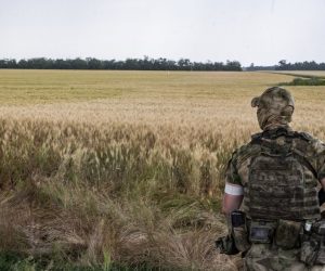 epa10013852 A Russian serviceman keeps watch in front of a wheat field near Melitopol, Zaporizhia region, Ukraine, 14 June 2022 (Issued on 15 June 2022). The conflict in Ukraine has affected the availability and price of wheat worldwide. The Food and Agriculture Organization (FAO) of the United Nations said in its 10 June note assessing the risks emanating from the conflict in Ukraine that 'the current war raises concerns over whether crops will be harvested. It has already led to the closures of ports and oilseed crushing operations, affecting products intended for the export markets'. These are taking a toll on the country's exports of grains and vegetable oils. The city of Melitopol is located on the territory controlled by the troops of the Russian Federation and the city is administered by the Military-Civilian Administration controlled by Russia. On 24 February 2022 Russian troops entered the Ukrainian territory in what the Russian president declared a 'Special Military Operation', starting an armed conflict that has provoked destruction and a humanitarian crisis.  EPA/SERGEI ILNITSKY