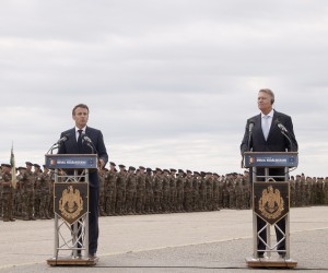 epa10013981 French President Emmanuel Macron (L) and Romanian President Klaus Iohannis (R) deliver statements as they visit NATO forces at the Mihail Kogalniceanu Air Base, near the city of Constanta, Romania, 15 June 2022. Macron is visiting Romania to hold bilateral talks and meet with NATO troops stationed at the airbase.  EPA/YOAN VALAT / POOL