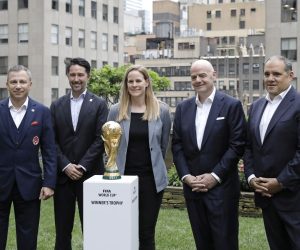 epa10017324 (L-R) Nick Bontis, President of Canada Soccer, Yon de Luisa Plazas, President of the Mexican Football Federation, US Soccer President Cindy Parlow Cone, FIFA President Gianni Infantino, and Vice President Vittorio Montagliani, pose for photographers with the FIFA World Cup trophy at Radio City in New York, New York, USA, 16 June 2022.The North American cities hosting the 2026 World Cup were announced, eleven sites are in the US, three are in Mexico, and two in Canada.  EPA/Peter Foley