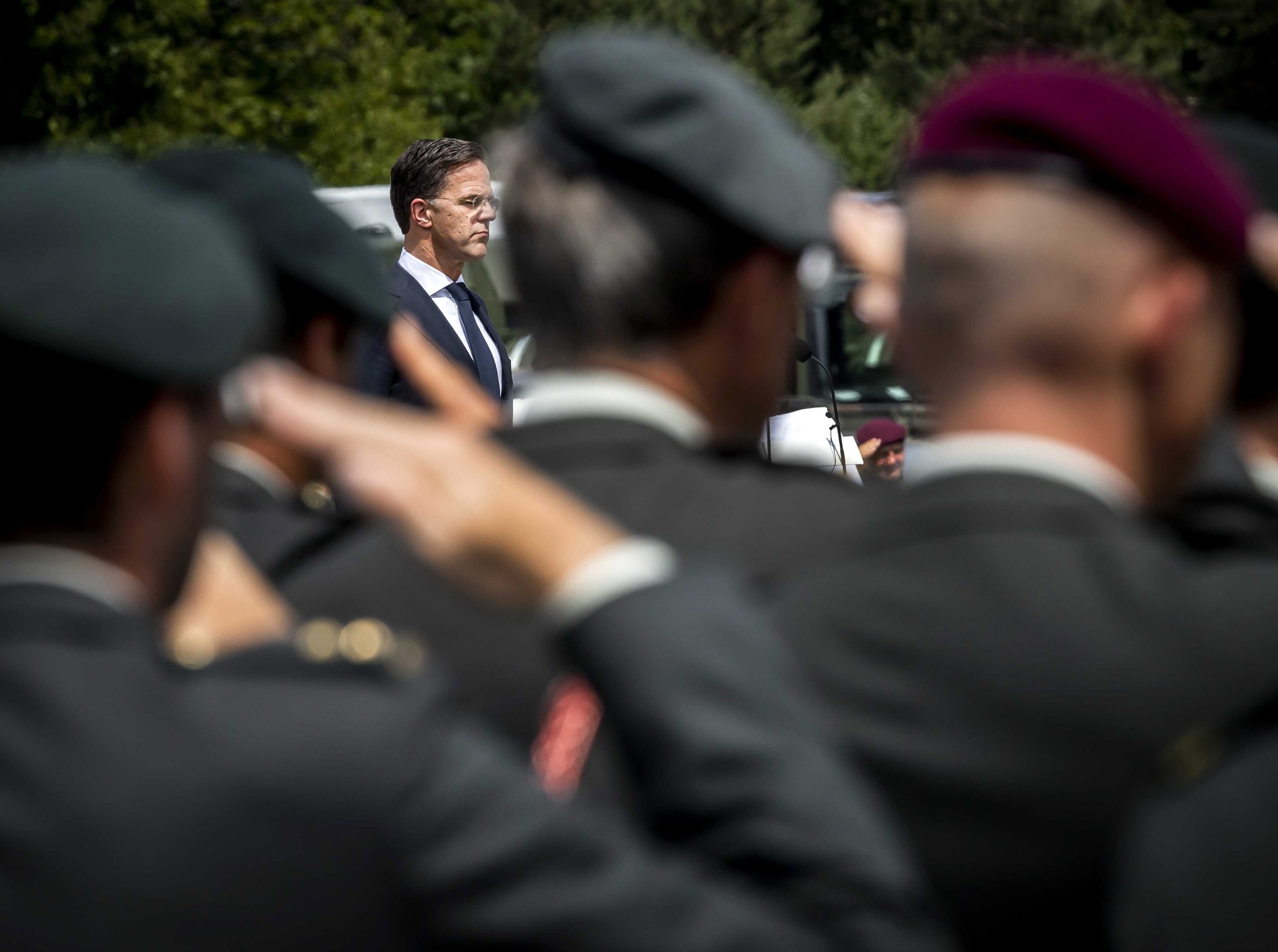 epa10020328 Prime Minister Mark Rutte gives a speech during a meeting of veterans of Dutchbat III peacekeeping unit in the Oranjekazerne in Schaarsbergen, Arnhem, Netherlands, 18 June 2022. Prime Minister Mark Rutte offered formal apologies from the Dutch government to soldiers of Dutchbat-III peacekeeping unit who had to guard the Bosnian enclave of Srebrenica in 1995  EPA/REMKO DE WAAL