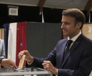 epa10021819 French President Emmanuel Macron casts his ballot in Le Touquet, northern France, 19 June 2022. French voters are going to the polls in the final round of key parliamentary elections that will demonstrate how much legroom President Emmanuel Macron’s party will be given to implement his ambitious domestic agenda.  EPA/Michel Spingler / POOL  MAXPPP OUT