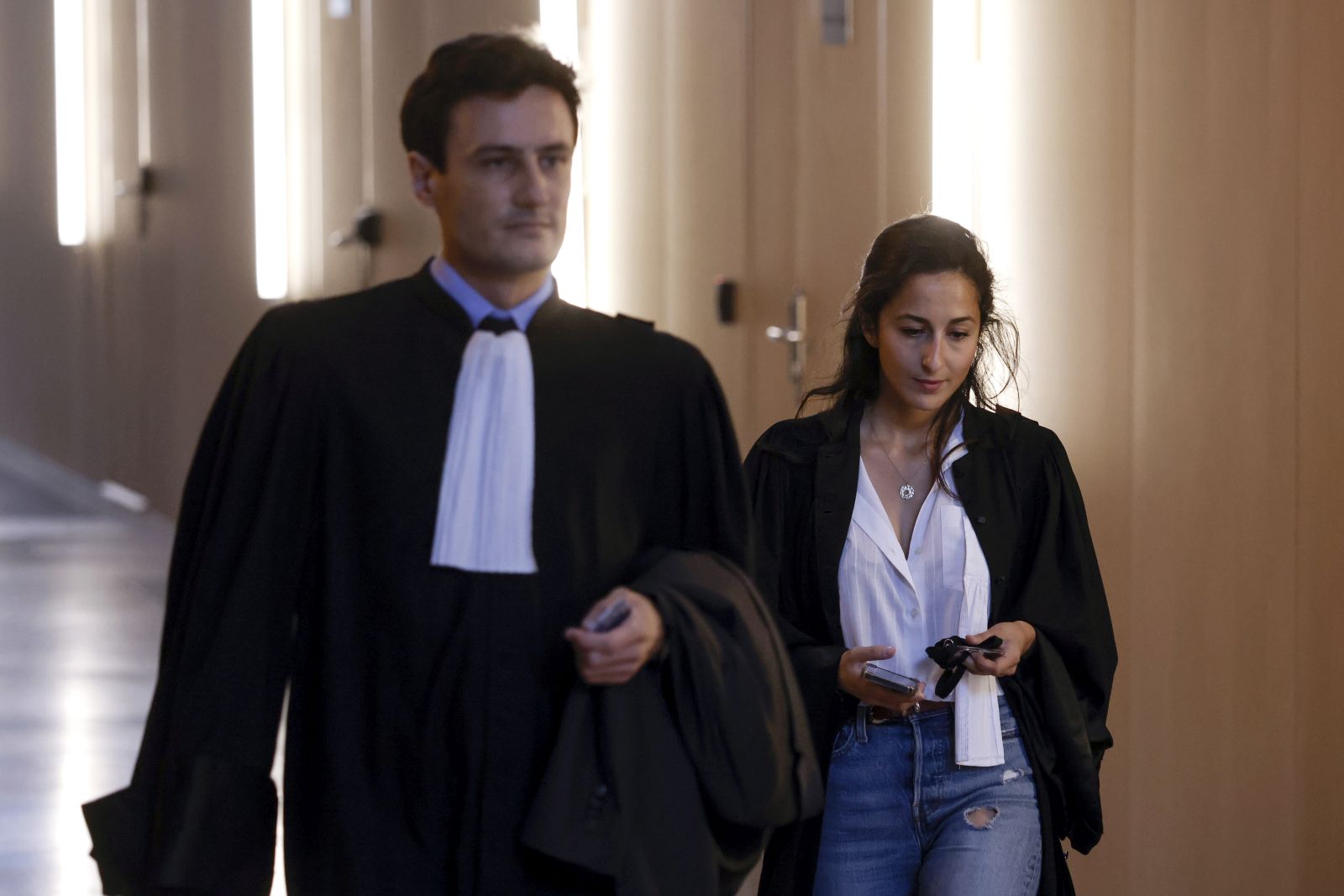 epa10031750 (L-R) Martin Vettes and Olivia Ronen, lawyers of Salah Abdeslam, accused of being involved in the 2015 Paris attacks, arrive at the courthouse in Paris, France, 24 June 2022. The trial over the 13 November 2015 terrorist attacks began on 08 September 2021 and it is expected to last nine months. Over 130 people were killed and hundreds injured in a series of coordinated attacks in Paris targeting the Bataclan concert hall, the Stade de France national sports stadium, and several restaurants and bars.  EPA/YOAN VALAT