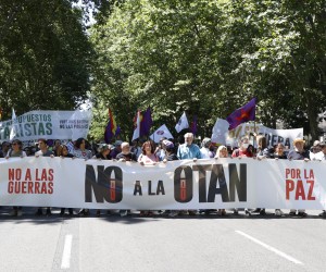 epa10034868 People attend a protest against NATO ahead of a NATO summit to be held in Madrid, Spain, 26 June 2022. A NATO Summit will be held in Madrid from 29 to 30 June.  EPA/J.J. Guillen