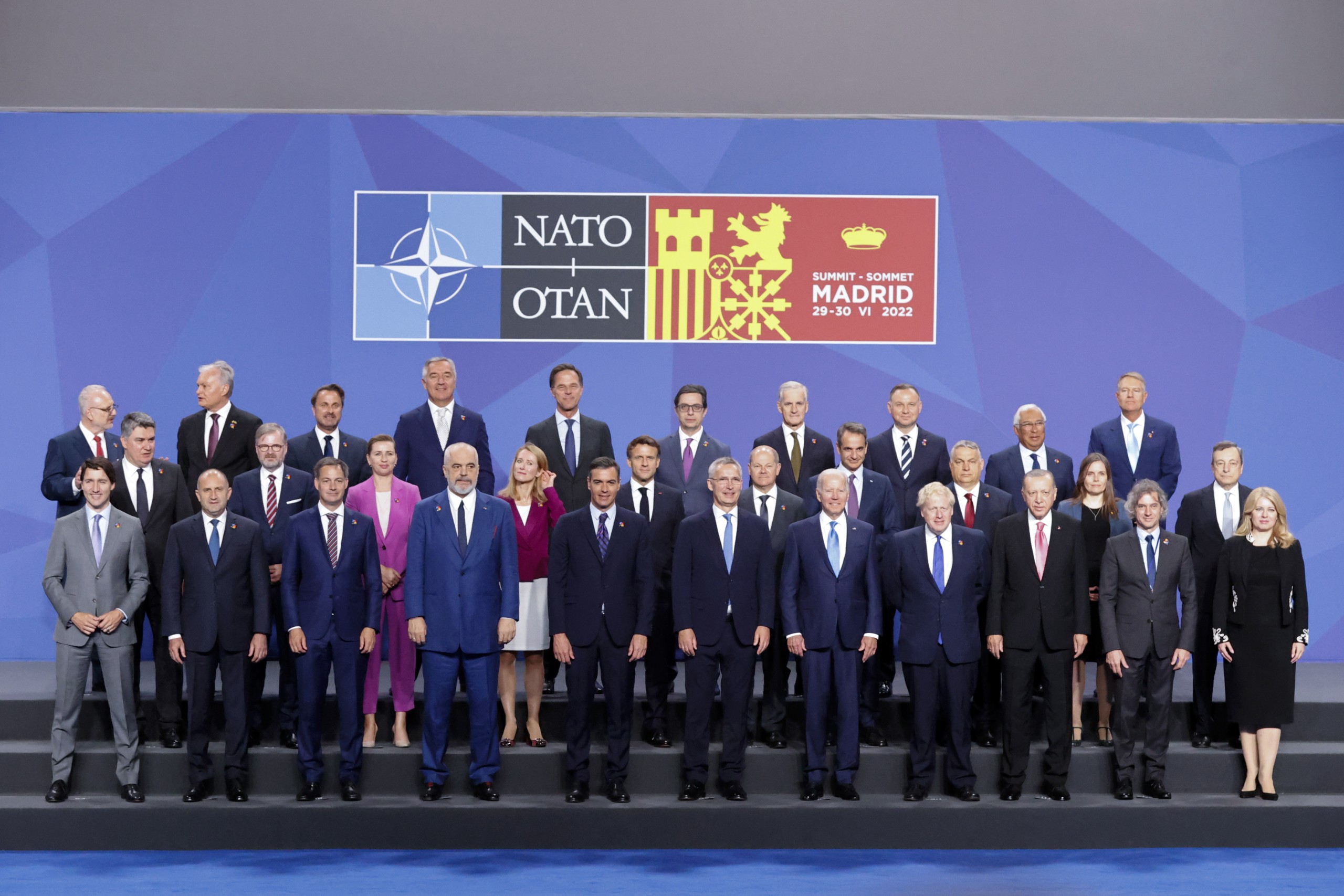 epa10040460 Spanish Prime Minister, Pedro Sanchez (first row, C-L), and NATO Secretary-General, Jens Stoltenberg (first row, C-R), pose for a family photo with the Heads of State and Government of NATO's member countries and key partners, on the first day of the NATO Summit at IFEMA Convention Center, in Madrid, Spain, 29 June 2022. Heads of State and Government of NATO's member countries and key partners are gathering in Madrid from 29 to 30 June to discuss security concerns like Russia's invasion of Ukraine and other challenges. Spain is hosting 2022 NATO Summit coinciding with the 40th anniversary of its accession to NATO.  EPA/Brais Lorenzo