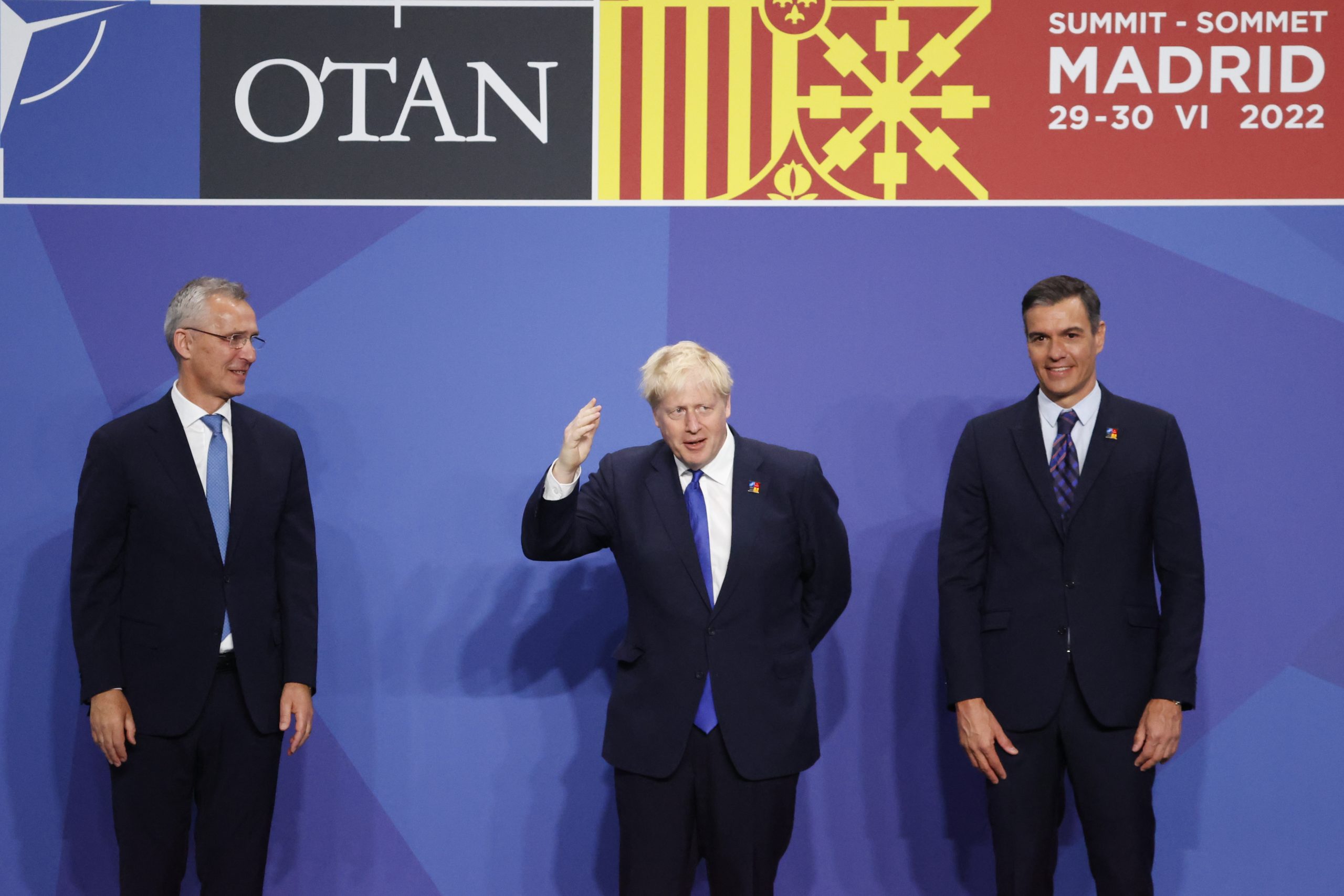 epa10040422 NATO Secretary General, Jens Stoltenberg (L), and Spanish Prime Minister, Pedro Sanchez (R), pose next to British Prime Minister, Boris Johnson, during the first day of the NATO Summit at IFEMA Convention Center, in Madrid, Spain, 29 June 2022. Heads of State and Government of NATO's member countries and key partners are gathering in Madrid from 29 to 30 June to discuss security concerns like Russia's invasion of Ukraine and other challenges. Spain is hosting 2022 NATO Summit coinciding with the 40th anniversary of its accession to NATO.  EPA/Brais Lorenzo
