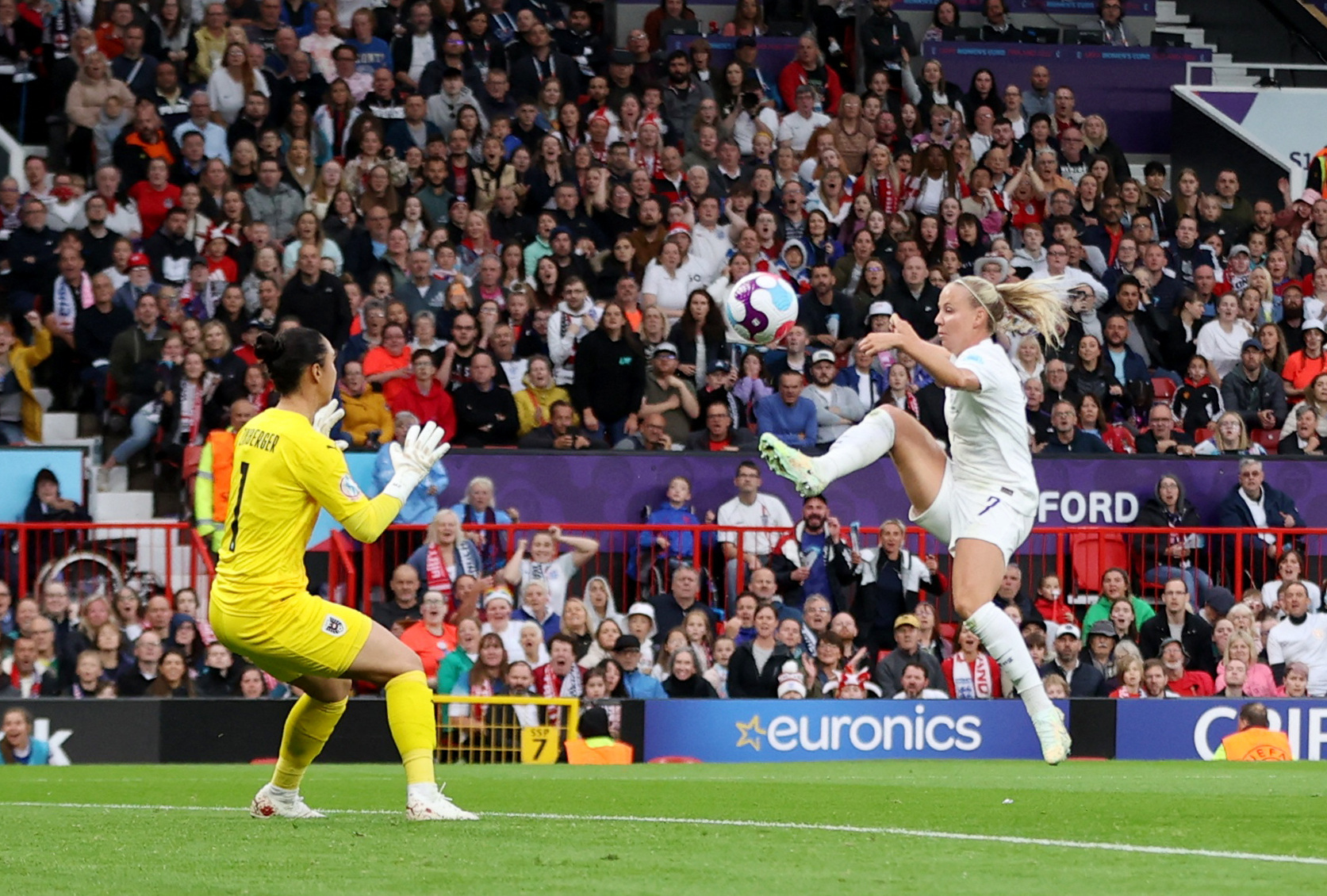 Soccer Football - Women's Euro 2022 - Group A - England v Austria - Old Trafford, Manchester, Britain - July 6, 2022  England's Beth Mead scores their first goal REUTERS/Molly Darlington
