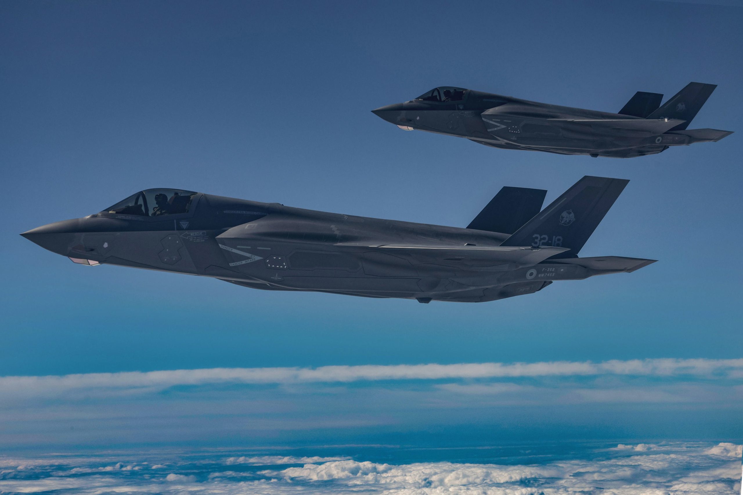 epa10037129 Two Italian Air Force F-35A multirole combat aircraft fly at an undisclosed location during the NATO-led defense operation 'Air Policing Northern Lightning III' from the Keflavik Air Base in Iceland, 27 June 2022. A squad of four F-35A aircraft of the 32nd Wing of the Italian Air Force joined the operation which aims at preserving 'the integrity of NATO's airspace in peacetime by strengthening the surveillance of the skies of Iceland'. Italy's Minister of Defense Lorenzo Guerini in a press release by his Ministry on 14 June was cited as saying that 'Air Policing in Iceland testifies to the crucial Italian contribution to the security of all NATO's European chessboards'.  EPA/GIUSEPPE LAMI