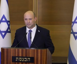 epa10041929 Israeli Prime Minster Naftali Bennett speaks during a media statement in the Knesset in Jerusalem, Israel, 29 June 2022. Bennett announced that he is retiring from political life. Parliament members are on a voting procedure to dissolve the government and go to early elections.  EPA/ABIR SULTAN
