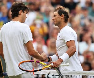 epa10055685 Rafael Nadal (R) of Spain is congratulated by Taylor Fritz (L) of the USA after winning their men's quarter final match at the Wimbledon Championships in Wimbledon, Britain, 06 July 2022.  EPA/KIERAN GALVIN   EDITORIAL USE ONLY