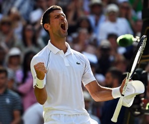 epa10059863 Novak Djokovic of Serbia celebrates after winning his men's semi final match against Cameron Norrie of Britain at the Wimbledon Championships in Wimbledon, Britain, 08 July 2022.  EPA/NEIL HALL   EDITORIAL USE ONLY