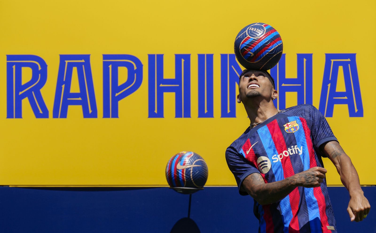 epa10072581 Brazilian forward Raphinha during his presentation as new signing of FC Barcelona during an event held at Sant Joan Despi Sport City in Barcelona, Catalonia, Spain on 15 July 2022.  EPA/Enric Fontcuberta
