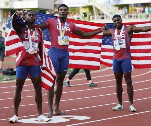 epa10075583 Winner Fred Kerley (C) of the US, second place Marvin Bracy (R) of the US and third placed Trayvon Bromell celebrate after the men's 100m final at the World Athletics Championships Oregon22 at Hayward Field in Eugene, Oregon, USA, 16 July 2022.  EPA/John G. Mabanglo