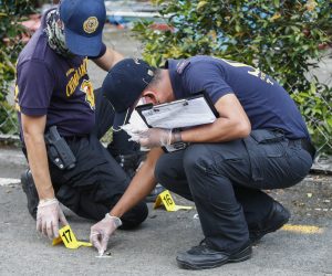 epa10089474 Philippine police investigate at areas related to a shooting incident at a university in Quezon City, Metro Manila, Philippines, 24 July 2022. Three people were killed and one other sustained injuries from a shooting incident as a law school commencement ceremony was scheduled to be held at the Ateneo de Manila University in Quezon City. Police investigators continue to determine motives for the shooting following the arrest of a suspect in the incident.  EPA/ROLEX DELA PENA