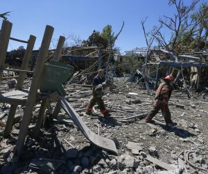 epaselect epa10092257 Rescuers walk among rubble at a site of a missile strike in Odesa area, Ukraine, 26 July 2022. A massive missile strike was inflicted on the south of Ukraine in the wee hours of 26 July by Russian forces from the waters of the Black Sea, the spokesperson of the Command of the Air Force of the Armed Forces of Ukraine said. Several private buildings and infrastructure objects were destroyed, no fatalities in that attack were reported. Russian troops on 24 February entered Ukrainian territory, starting a conflict that has provoked destruction and a humanitarian crisis.  EPA/STRINGER