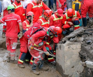 epa10097139 A handout photo made available by the Iranian Red Crescent Society (IRCS) shows rescue workers working at the site of a flash flood in Imam Zadeh Davood, north-west of Tehran, Iran, 29 July 2022. According to the Iranian Red Crescent Society quoting local officials, at least eight people have been killed in floods in Imam Zadeh Davood and some are still missing, as many cities are struggling with floods all over the Iran.  EPA/IRANIAN RED CRESCENT HANDOUT  HANDOUT EDITORIAL USE ONLY/NO SALES