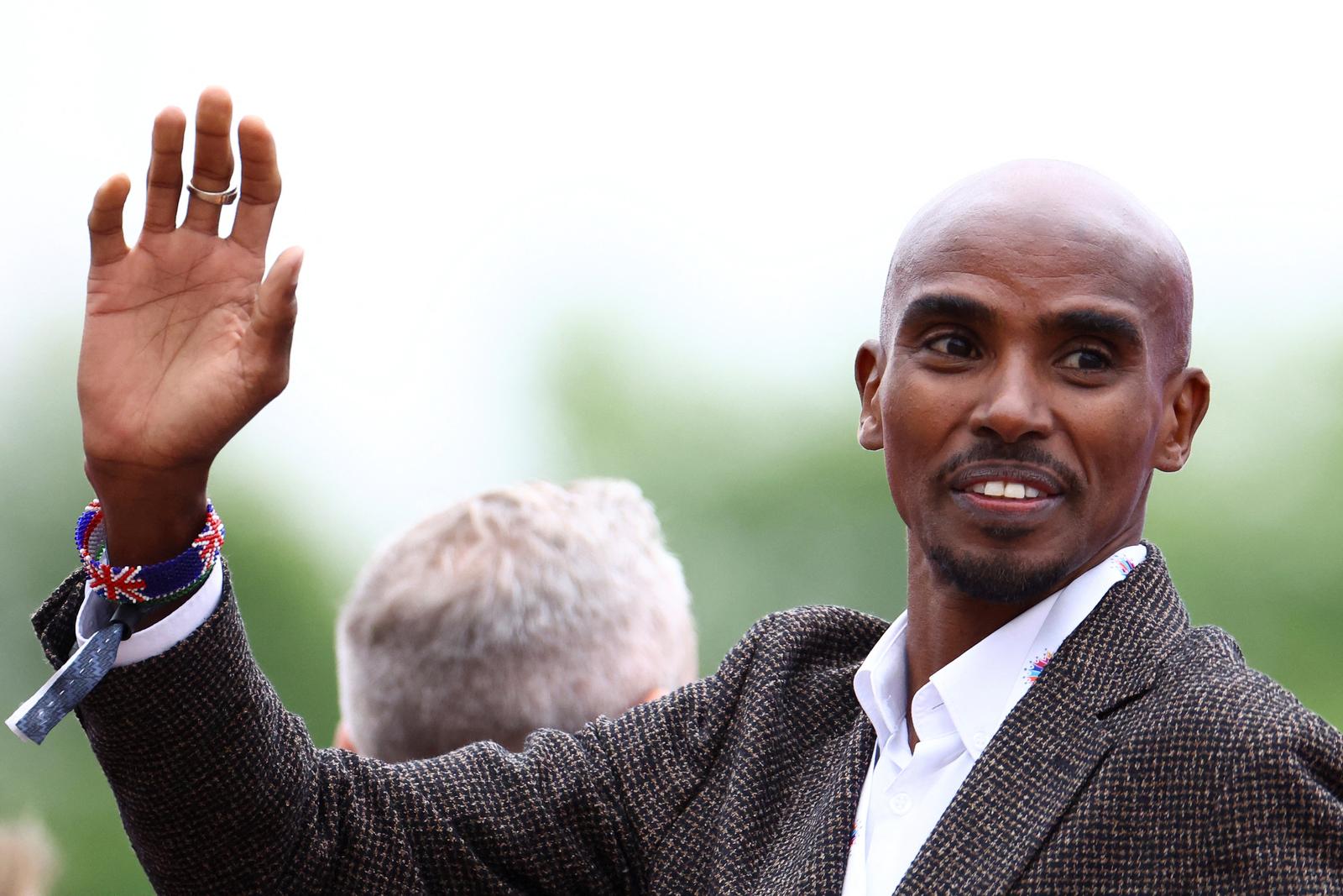 Former British track athlete Mo Farah attends the Platinum Jubilee Pageant, marking the end of the celebrations for the Platinum Jubilee of Britain's Queen Elizabeth, in London, Britain, June 5, 2022. REUTERS/Hannah McKay/Pool Photo: HANNAH MCKAY/REUTERS