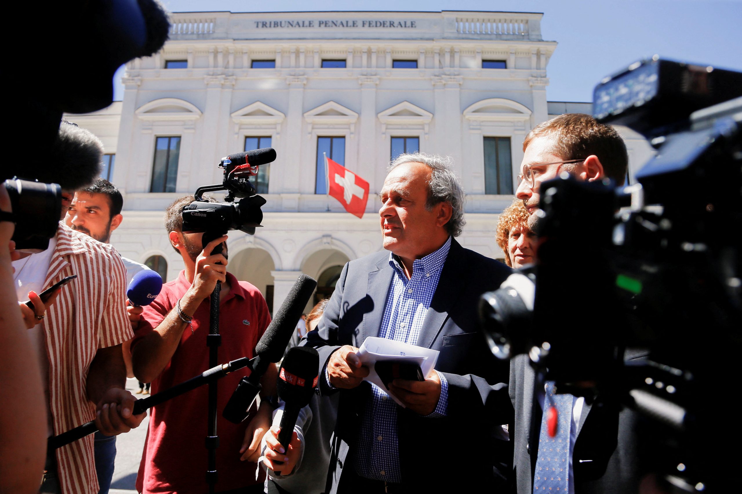 Former UEFA President Michel Platini speaks to the media after a trial at the Swiss Federal Criminal Court in Bellinzona, Switzerland July 8, 2022. REUTERS/Arnd Wiegmann Photo: ARND WIEGMANN/REUTERS