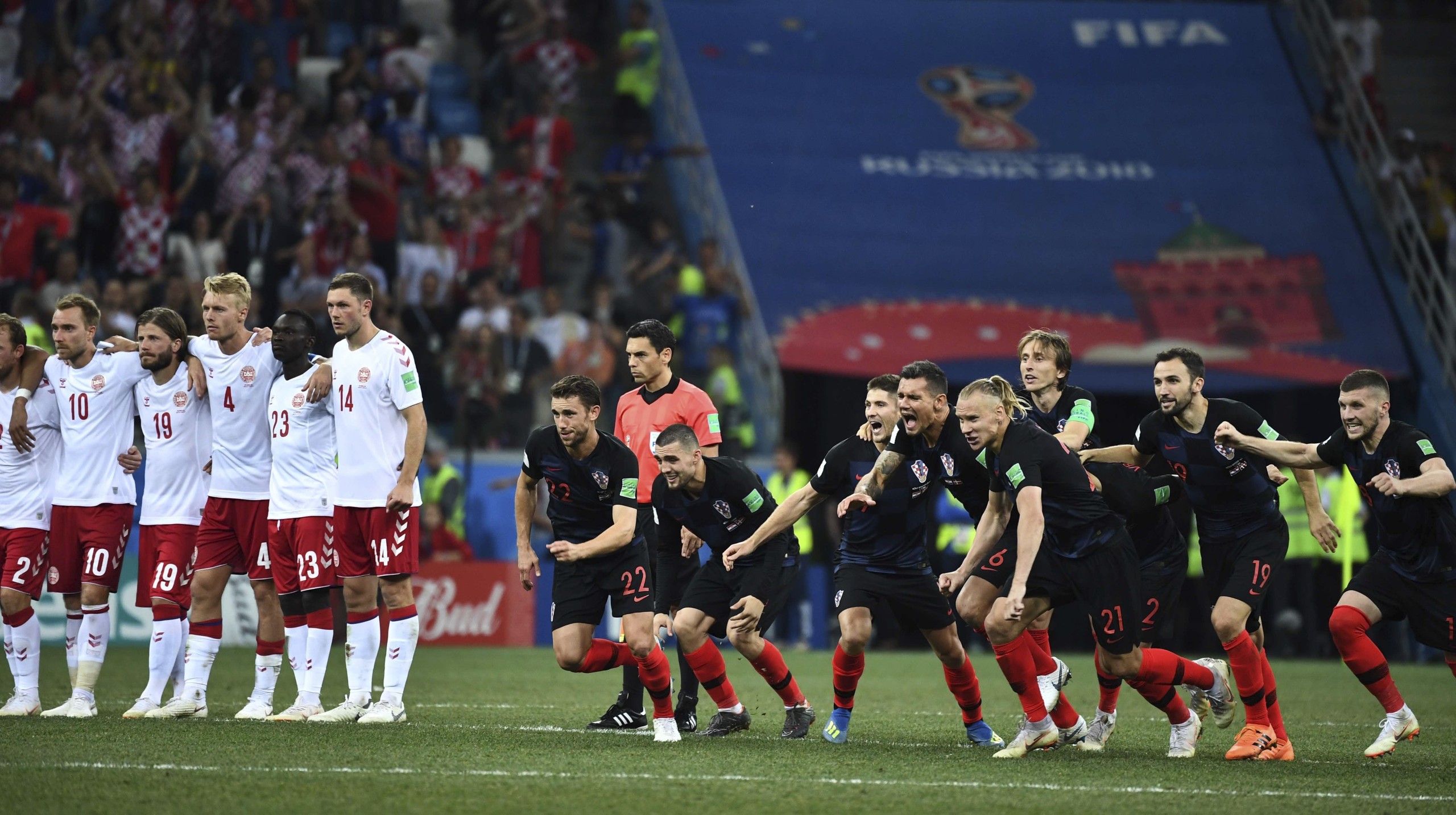 Players of Croatia celebrate after defeating Denmark in the Round of 16 match during the FIFA World Cup 2018 in Nizhny Novgorod, Russia, 1 July 2018. Croatia has come back after conceding in the opening minute to earn a World Cup quarter-final berth, edging Denmark 3-2 in a penalty shootout after the two sides drew 1-1 in the round of 16 match. It could have wrapped up the result five minutes from the end of extra-time, but Luka Modric had his penalty saved by Kasper Schmeichel. However, the Croatia captain returned to bravely take one of the post-match kicks as goalkeeper Danijel Subasic save three of Denmark's efforts to set up a quarter-final meeting with Russia.  (Imaginechina via AP Images)