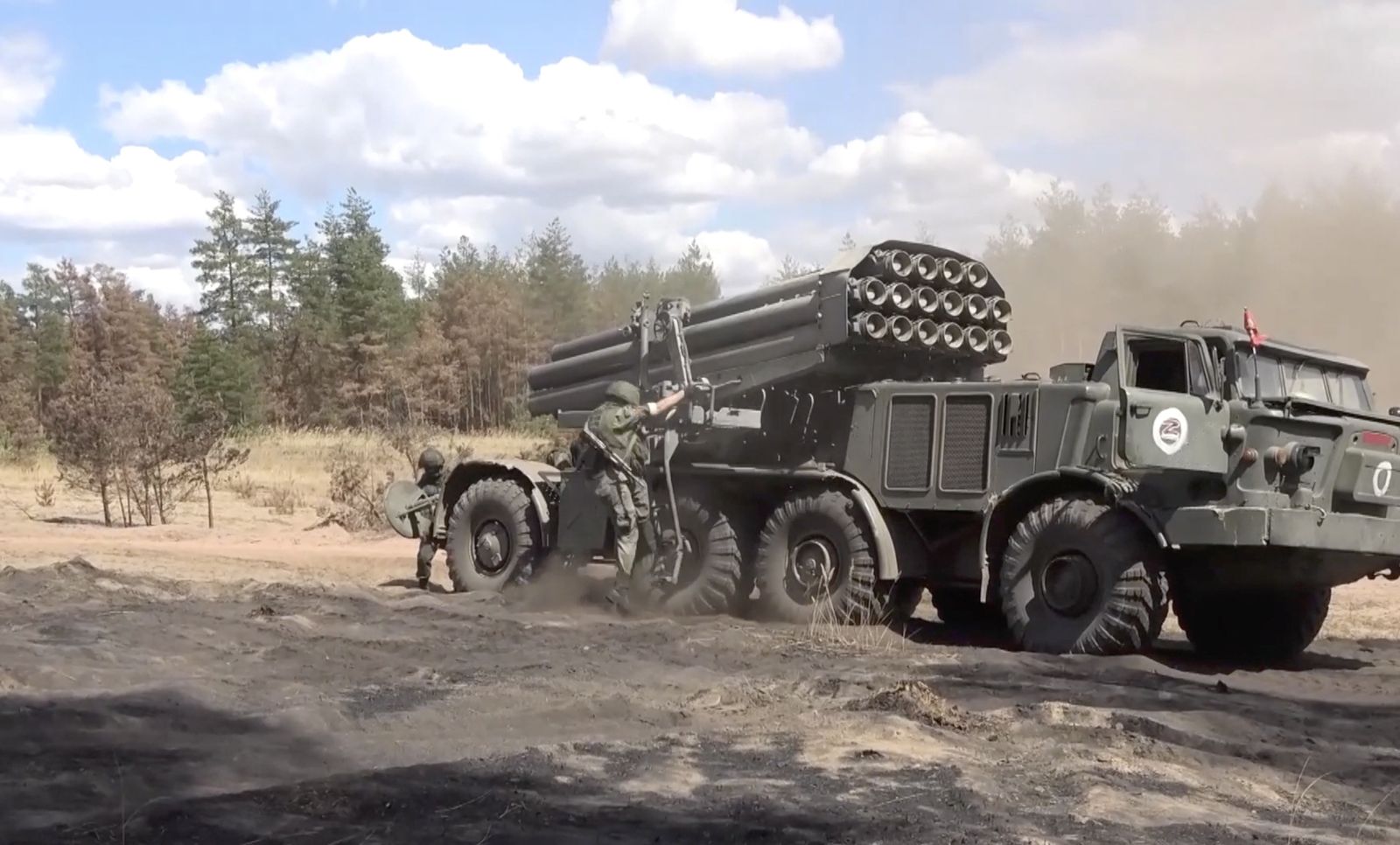 epa10083851 A handout still image taken from handout video provided  by the Russian Defence ministry press-service shows Russian servicemen preparing a Russian multiple launch rocket systems ‘Hurricane’ during battles in Ukraine, 21 July 2022. The servicemen of the Central Military District units marched to firing positions and, after receiving coordinates from unmanned aircraft, launched a missile attack on the positions and field warehouse of the Armed Forces of Ukraine, where US-made M777 howitzers were based.  EPA/RUSSIAN DEFENCE MINISTRY PRESS SERVICE/HANDOUT HANDOUT EDITORIAL USE ONLY/NO SALES HANDOUT EDITORIAL USE ONLY/NO SALES