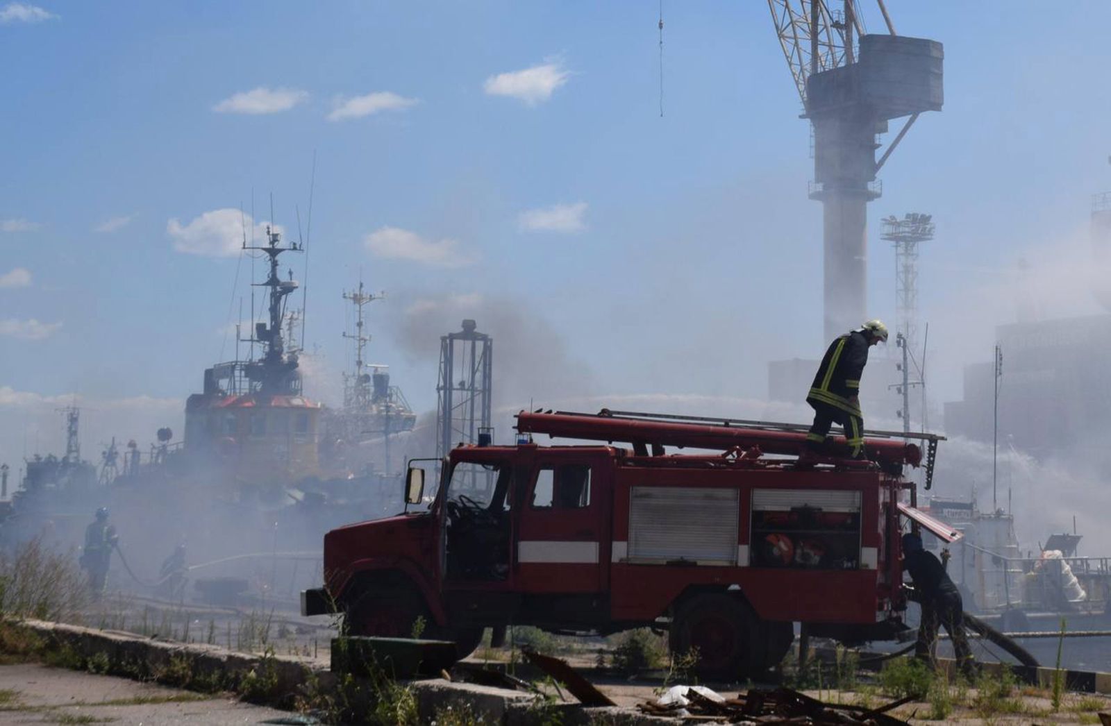 epa10088775 A handout photo released by the Odesa City Hall Press Office on 23 July 2022 shows firefighters working to put out a fire in a sea port of Odesa, southern Ukraine. Ukrainian authorities on 23 July said that the fire at the port was caused by a missile attack. Moscow and Kyiv on 22 July signed a landmark deal to aid grain exports and ease an international food crisis. Russian troops on 24 February entered Ukrainian territory, starting a conflict that has provoked destruction and a humanitarian crisis.  EPA/ODESA CITY HALL PRESS OFFICE HAN -- BEST QUALITY AVAILABLE -- MANDATORY CREDIT -- HANDOUT EDITORIAL USE ONLY/NO SALES