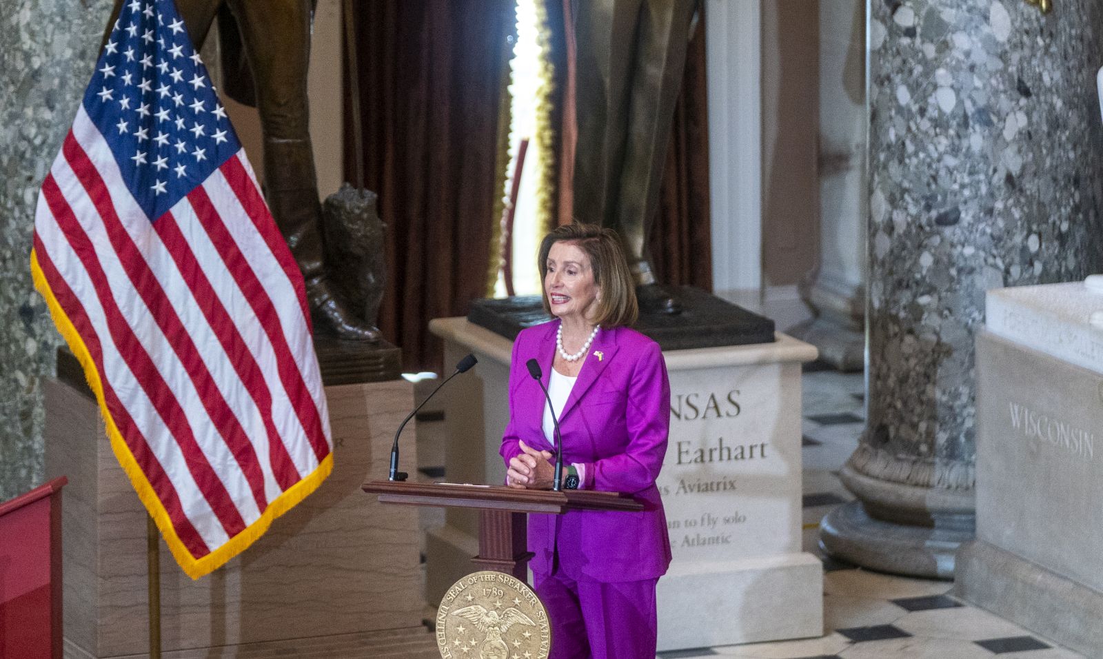 epa10094080 Speaker of the House Nancy Pelosi delivers remarks during a statue dedication ceremony honoring aviator Amelia Earhart of Kansas in Statuary Hall of the US Capitol in Washington, DC, USA, 27 July 2022.  EPA/SHAWN THEW