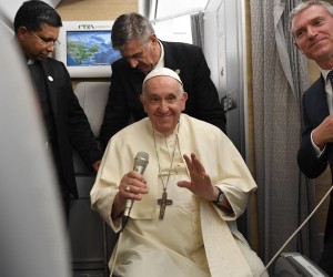epa10098152 A handout picture provided by the Vatican Media shows Pope Francis speaks to journalists  aboard an airplane departured from Canada on his way back to the Vatican, 30 July 2022.  EPA/VATICAN MEDIA HANDOUT  HANDOUT EDITORIAL USE ONLY/NO SALES