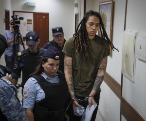 epa10102439 Two-time Olympic gold medalist and WNBA's Phoenix Mercury player Brittney Griner (R) is escorted to a courtroom for a hearing at the Khimki City Court outside Moscow, Russia, 02 August 2022. Griner, a World Champion player of the WNBA's Phoenix Mercury team was arrested in February at Moscow's Sheremetyevo Airport after some hash oil was detected and found in her luggage, for which she now could face a prison sentence of up to ten years.  EPA/YURI KOCHETKOV