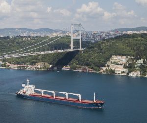 epaselect epa10104043 An aerial picture taken by drone shows Sierra Leone-flagged cargo ship Razoni that left the port of Odessa with the first grain shipment for export, sails under Fatih Sultan Mehmet Bridge through the Bosphorus after an inspection in Istanbul, Turkey, 03 August 2022. The Razoni carries over 26,000 tons of corn and is bound for Tripoli, Lebanon with a stopover in Istanbul for inspection. It is the first ship exporting Ukrainian grain since a safe passage deal was signed between Ukraine and Russia on 22 July in Istanbul.  EPA/TOLGA BOZOGLU
