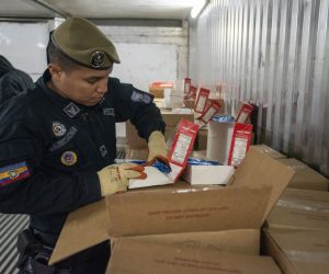 epa10104180 Anti-narcotics police search for drugs in several containers, in the Port of Guayaquil, in Guayaquil, Ecuador, 22 July 2022 (Issued 3 August 2022). Through fake fruits, inside wood, between boxes of shrimp, bananas, cereals, scrap, or even in tea bottles, drug trafficking has made the port of Guayaquil in Ecuador one of the great springboards to 'export' tons of cocaine in multiple forms from South America to mainly Europe and the United States.  EPA/Mauricio Torres