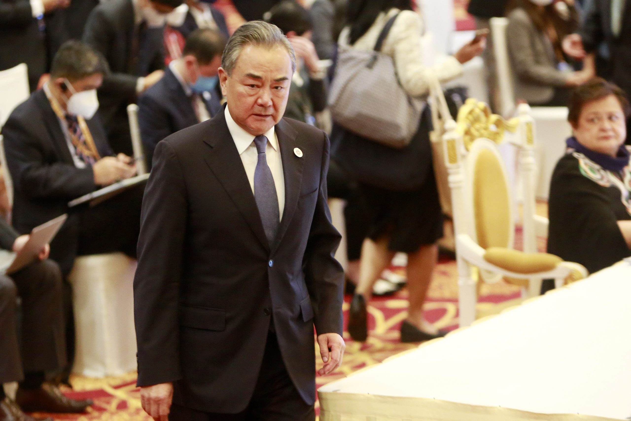 epa10104958 Chinese Foreign Minister Wang Yi (C) attends the ASEAN-China Ministerial Meeting at a hotel in Phnom Penh, Cambodia, 04 August 2022. Cambodia is hosting the 55th ASEAN Foreign Ministers' Meeting (AMM) and related meetings from 31 July to 06 August 2022.  EPA/KITH SEREY