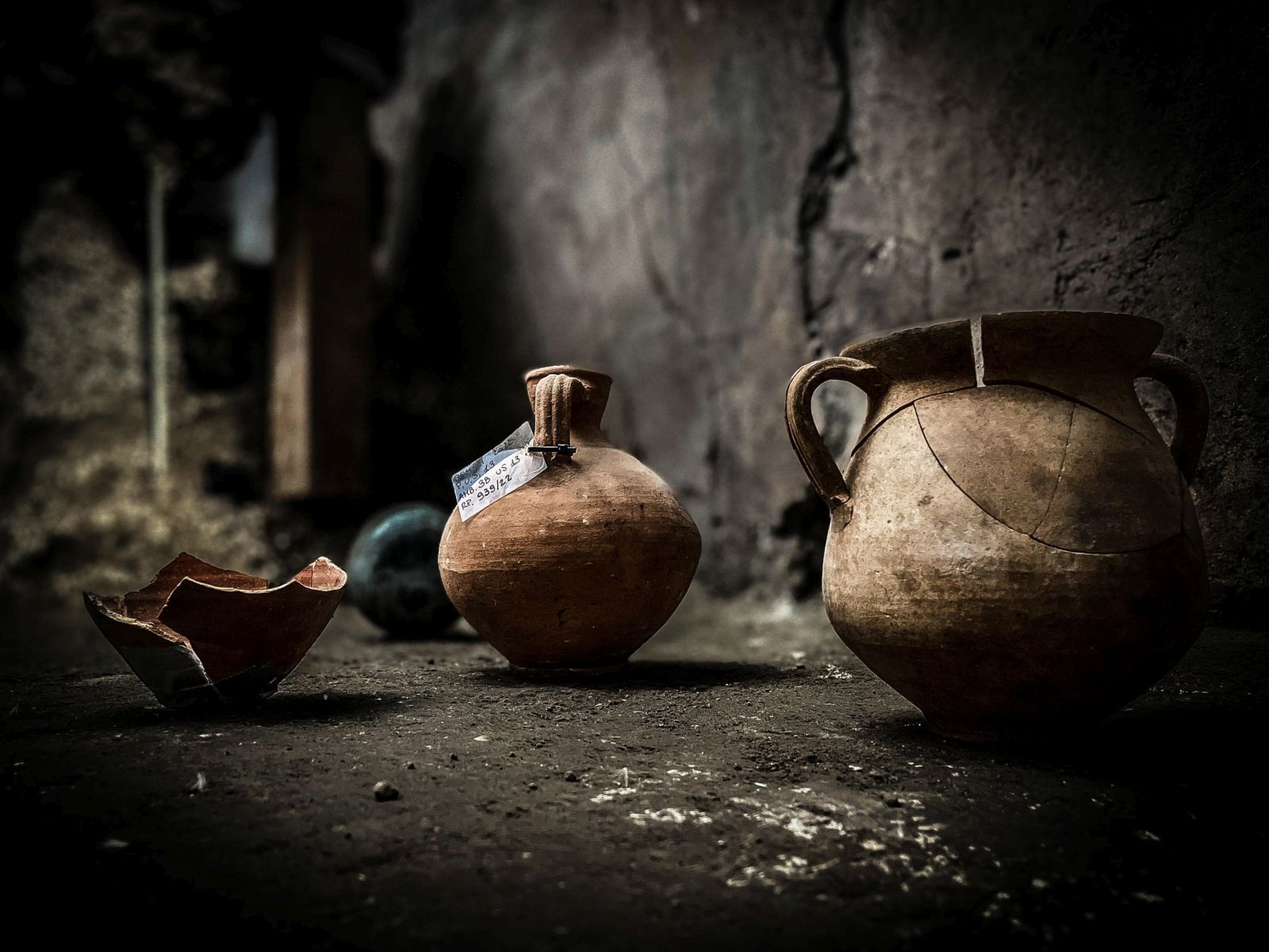 epa10108462 Amphorae and furnishings, found in the house of the 'enchanted garden' in Pompeii, Italy, 06 August 2022. The house of the middle class contains five small rooms plus bathroom and kitchen overlooking a beautiful garden.  EPA/Cesare Abbate