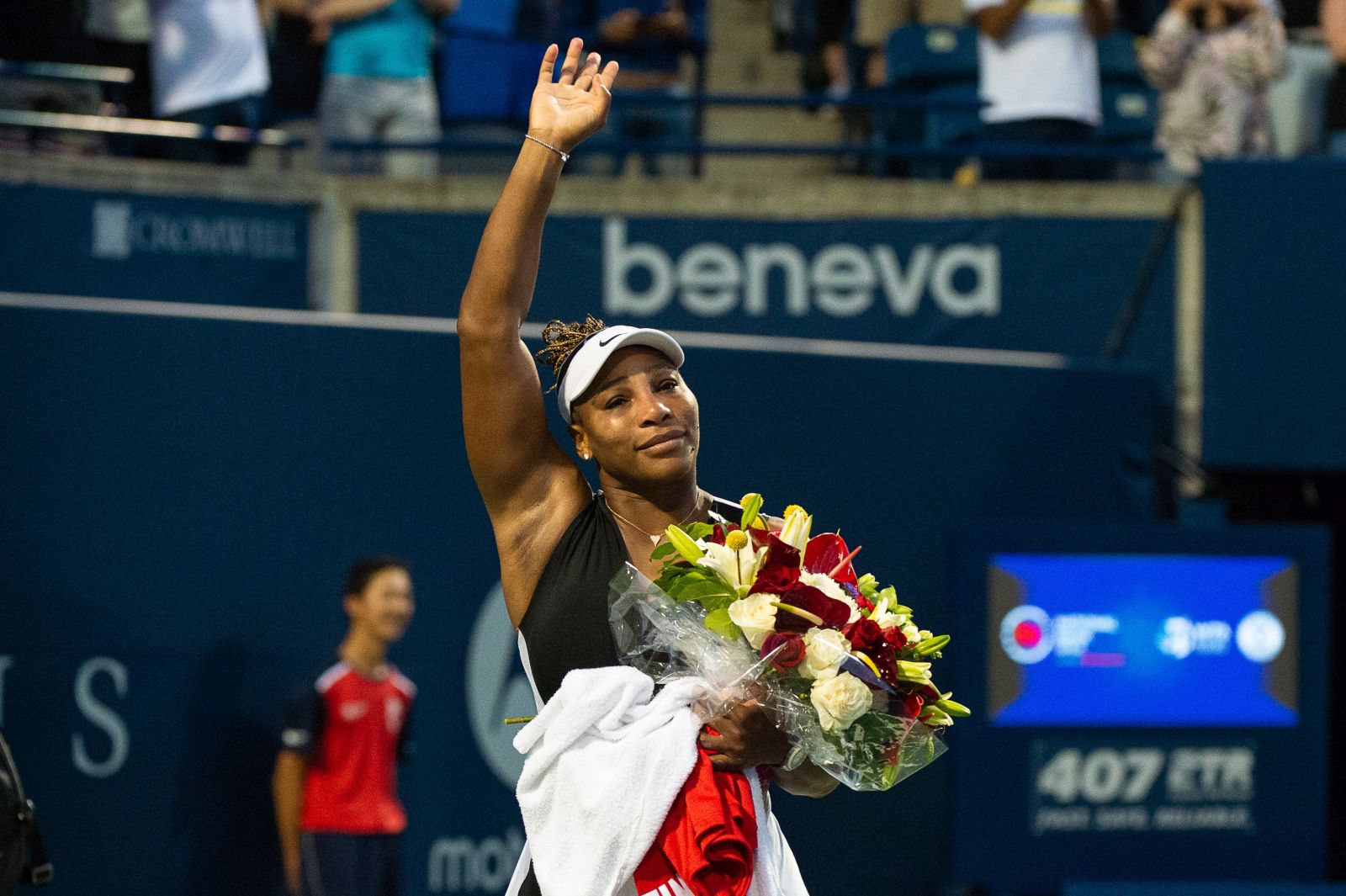 epa10115043 Serena Williams of the US acknowledges the crowd after her match against Belinda Bencic of Switzerland, during the second round of the National Bank Open women's tennis tournament, in Toronto, Canada, 10 August 2022.  EPA/EDUARDO LIMA