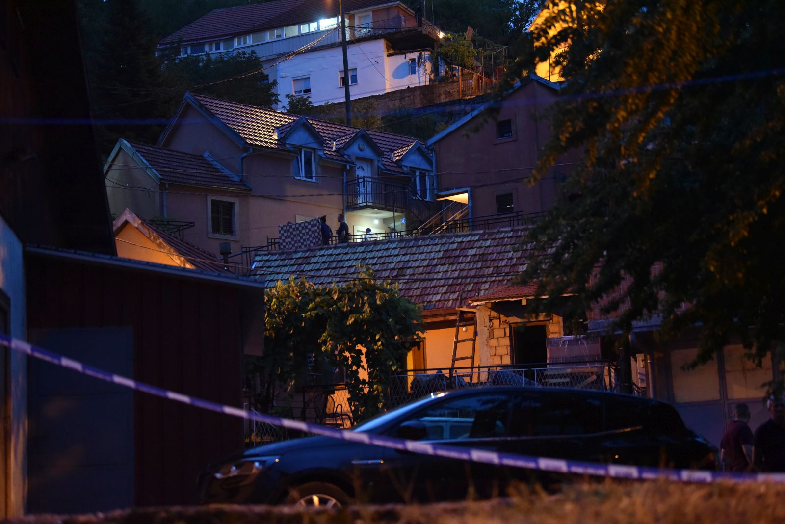 epa10117910 A crime scene investigator inspects the crime scene at Cetinje, Montenegro, 12 August 2022. A 34 year old male in Montenegro went on a shooting rampage after a family dispute, killing at least 10 people on the street before being gunned down in an exchange of fire with the police.  EPA/BORIS PEJOVIC