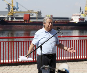 epa10128901 UN Secretary-General Antonio Guterres speaks to journalists at the end of his visit to the Odesa grain port, where in the background Comoros-flagged cargo vessel Kubrosli Y moors, in Odesa, Ukraine, 19 August 2022. Guterres arrived in Ukraine the previous dayto meet with President Zelensky and Turkish President Erdogan to talk on improving the grain initiative and the situation around the Zaporizhzhia nuclear power plant. The port of Odesa is being used for the export of Ukrainian grain through the Ukraine-Russia agreement promoted by the UN and Turkey. Russian troops on 24 February entered Ukrainian territory, starting a conflict that has provoked destruction and a humanitarian crisis.  EPA/MANUEL DE ALMEIDA