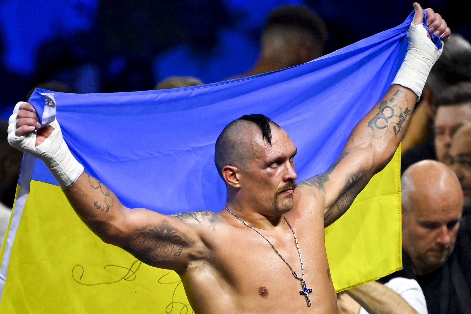 epa10131332 Oleksandr Usyk of Ukraine reacts after defeating Anthony Joshua of Great Britain during the world heavyweight title fight between IBF, WBA and WBO titleholder Oleksandr Usyk and his challenger Anthony Joshua, at the Jeddah Superdome, Saudi Arabia, 21 August 2022. It is the second bout between the two after Usyk beat Joshua in London in September 2021.  EPA/ALI HAMED KHAMAJ