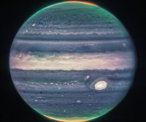 epa10134081 A handout photo made available by NASA shows a Webb NIRCam composite image of Jupiter from three filters and alignment due to the planet’s rotation, issued 22 August 2022. The image is a composite, and shows Jupiter in enhanced color, featuring the planet's turbulent Great Red Spot, which appears white here. The planet is striated with swirling horizontal stripes of neon turquoise, periwinkle, light pink, and cream. The stripes interact and mix at their edges like cream in coffee. Along both of the poles, the planet glows in turquoise. Bright orange auroras glow just above the planet’s surface at both poles.  EPA/NASA, ESA, CSA, Jupiter ERS Team / HANDOUT  HANDOUT EDITORIAL USE ONLY/NO SALES