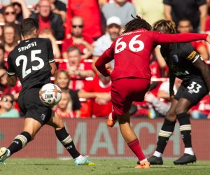 epa10141681 Liverpool's Trent Alexander-Arnold scores the third goal making the score 3-0 during the English Premier League soccer match between Liverpool and Bournemouth at Anfield in Liverpool, Britain, 27 August 2022.  EPA/PETER POWELL EDITORIAL USE ONLY. No use with unauthorized audio, video, data, fixture lists, club/league logos or 'live' services. Online in-match use limited to 120 images, no video emulation. No use in betting, games or single club/league/player publications
