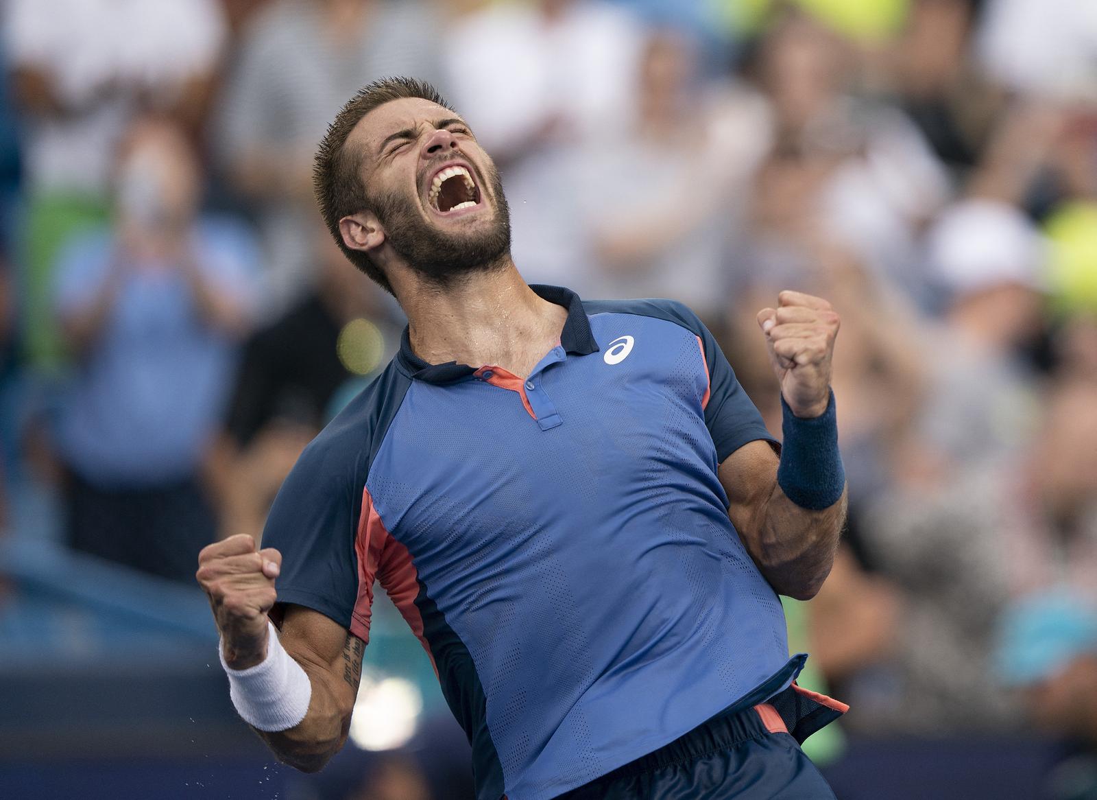 Aug 21, 2022; Cincinnati, OH, USA; Borna Coric (CRO) celebrates winning the men’s final match against Stefanos Tsitsipas (GRE) at the Western & Southern Open at the Lindner Family Tennis Center. Mandatory Credit: Susan Mullane-USA TODAY Sports Photo: Susan Mullane/REUTERS