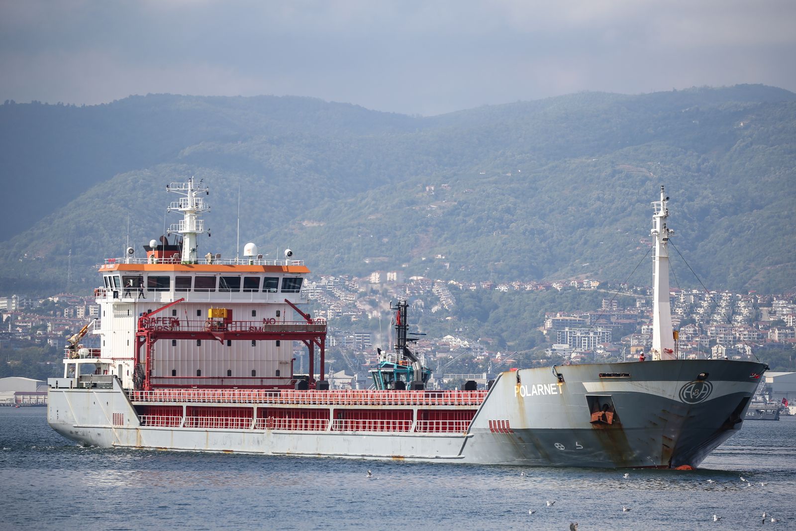 epa10111211 Turkish-flagged cargo ship Polarnet, that left the Ukrainian port of Chernomorsk with grain shipment for export, arrived to Safiport Derince, Kocaeli, Turkey, 08 August 2022. Polarnet, will unload 12 thousand tons of corn at the Turkish port. A safe passage deal was signed between Ukraine and Russia for export Ukraine grain on 22 July in Istanbul.  EPA/ERDEM SAHIN