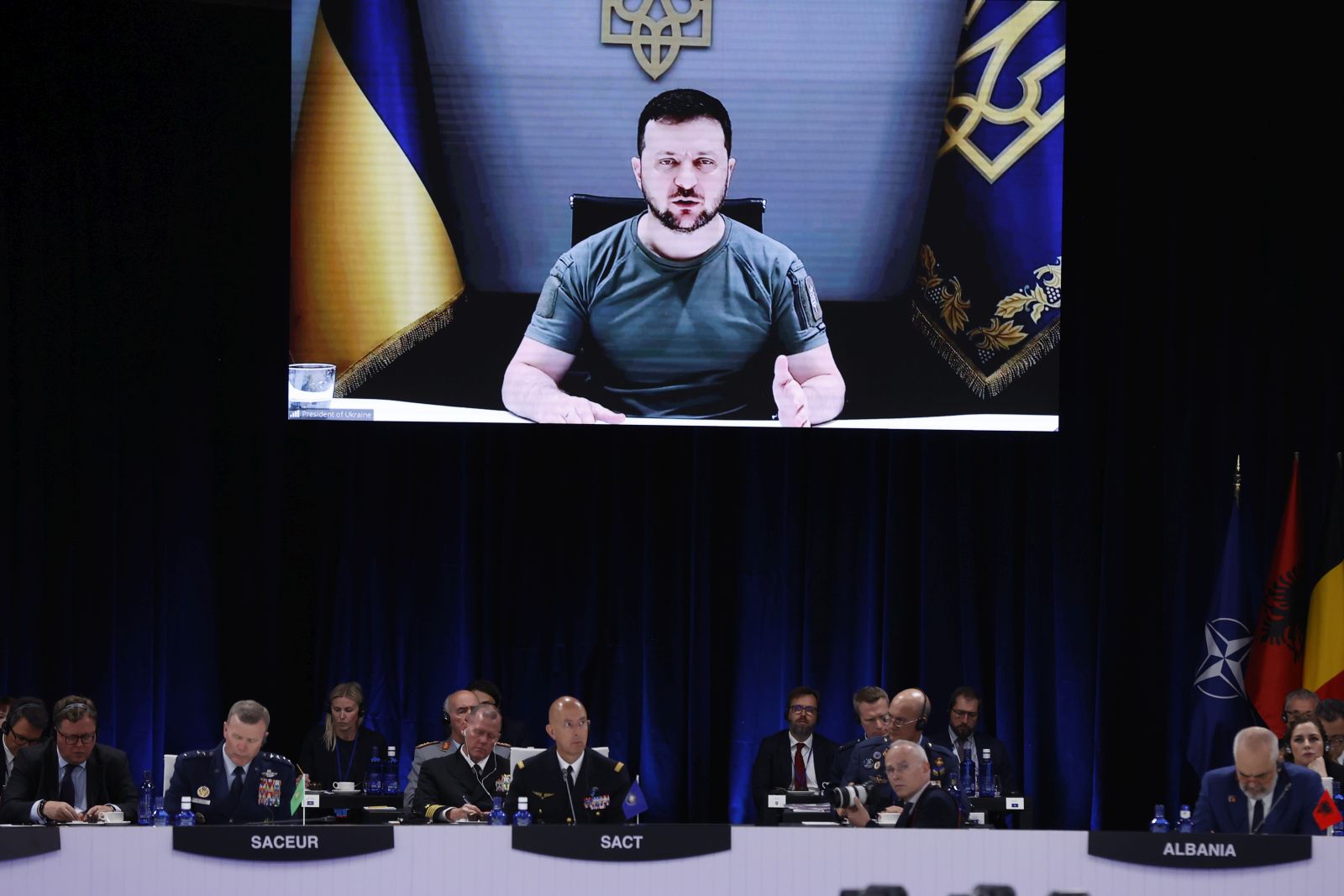 epa10134565 (FILE) - Ukrainian President Volodymyr Zelensky (on the screen), delivers a speech as he attends by video conference a meeting during the first day of the NATO Summit at IFEMA Convention Center, in Madrid, Spain, 29 June 2022. (Issued 23 August 2022). Ukraine marks, on 24 August 2022, six months since the war with Russia started.  EPA/Juan Carlos Hidalgo  ATTENTION: This Image is part of a PHOTO SET